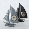 1021685 Table clock Segelboot, 2 ass, Analogue, H 40 cm, Iron, grey-blue